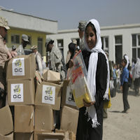 Children receiving their school supplies